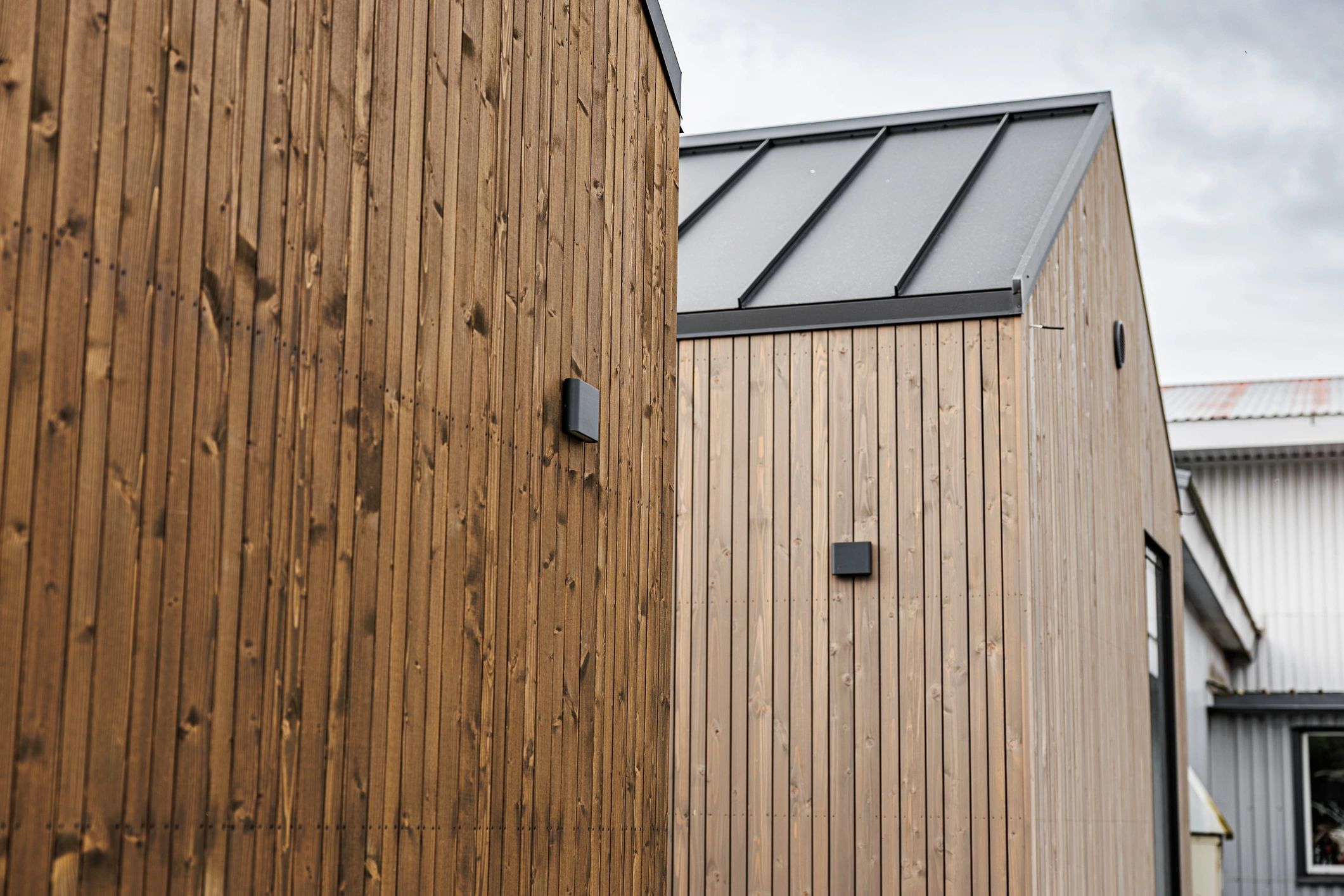 Natural timber cladding detail representing long-term quality and aftercare