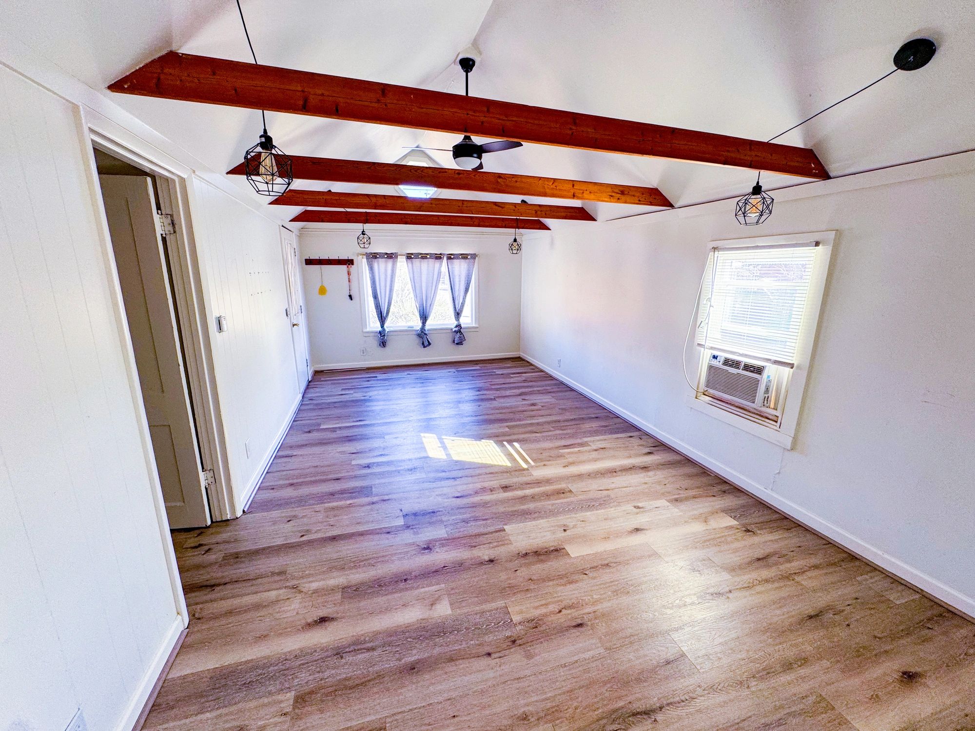 Tiny home living area with exposed timber details