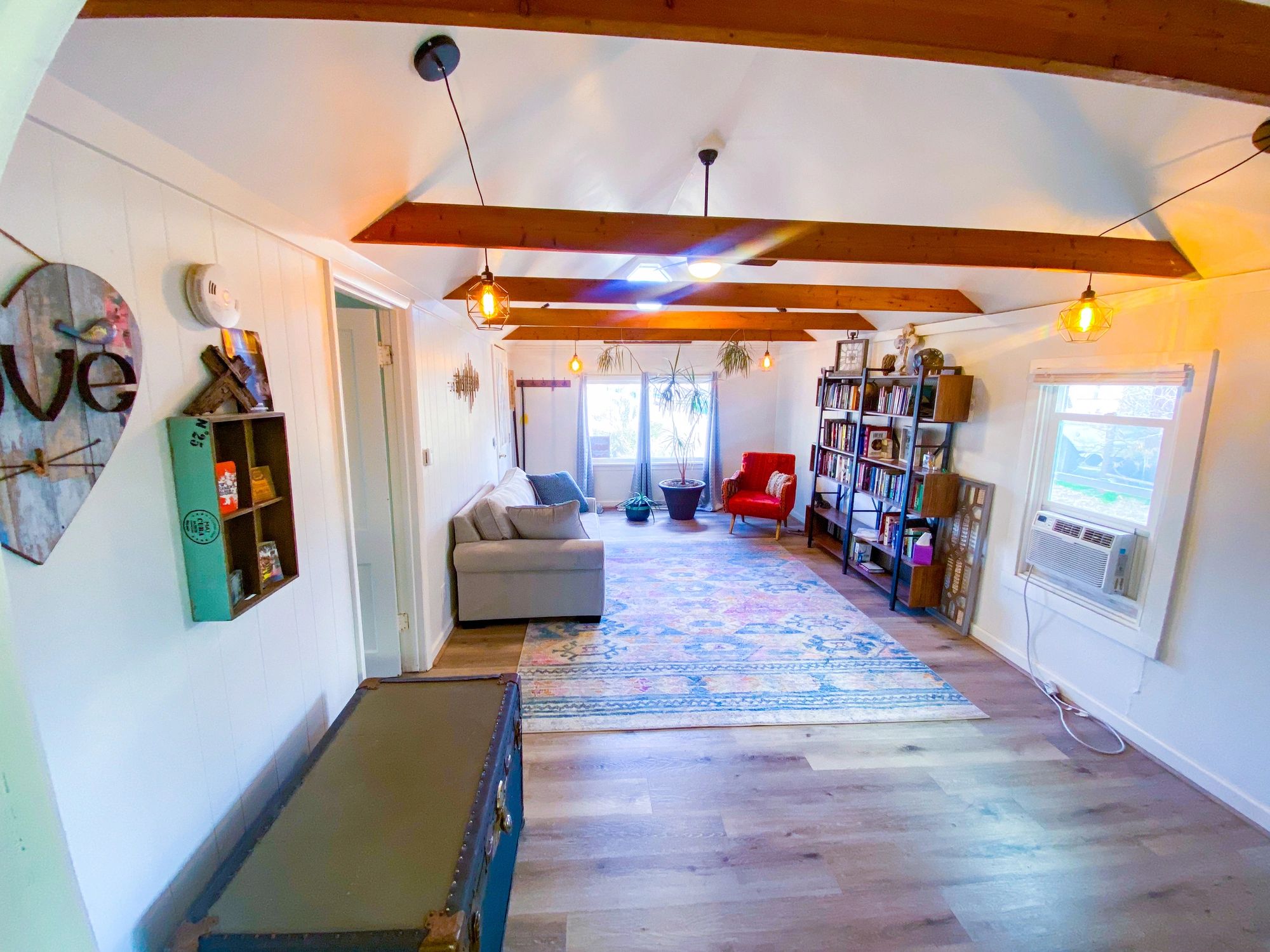 Tiny home style interior used as a placeholder for a future cost calculator section